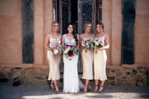 Bridesmaids posing for a group photo - brisbane wedding photographer