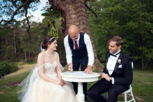 Newly wedded couple just finished signing the marriage certificate – Sunshine Coast Wedding Photographer